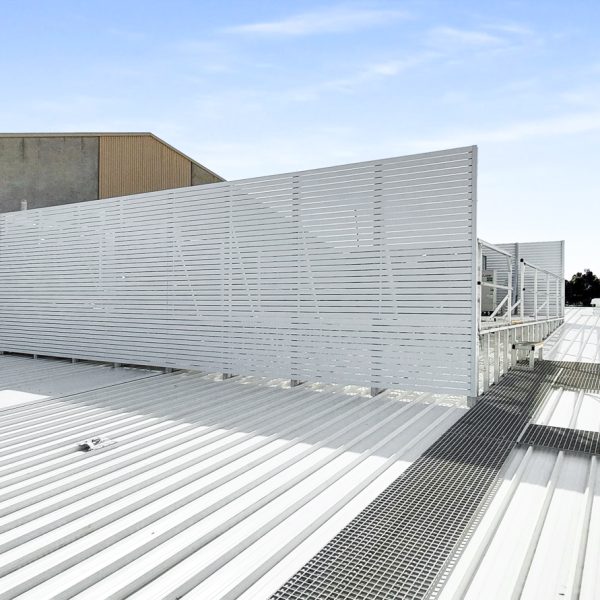 Roof plant platform with guardrails and slatted screen at basketball stadium - Marion, SA