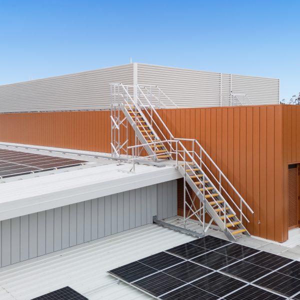 Plant platform with HVAC louvre screen and aluminium access stairs at aquatic centre - Mount Barker, SA