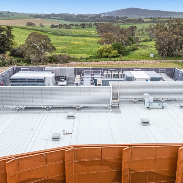 Rafter mount plant platform with louvre screen on aquatic centre roof - Mount Barker, SA