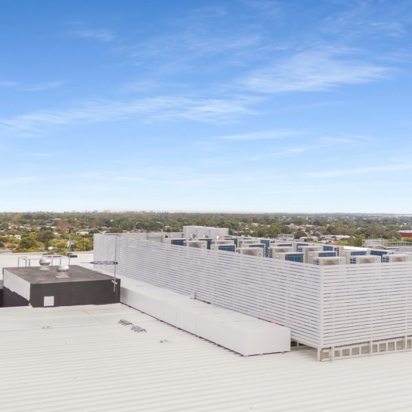 Roof mount HVAC plaform with slatted HVAC screen on apartment building - Tonsley, SA