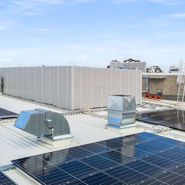 Supermarket condenser deck with HVAC slatted screen at Woolworths - Hillside, VIC
